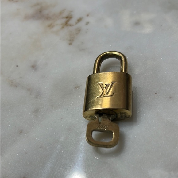 Louis Vuitton Gold Padlock with brass Unpolished - Picture 1 of 4
